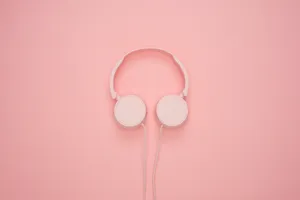 4k Tablet Pink Headphones Wallpaper