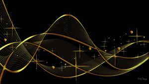 A Black And Gold Desktop With Gleaming Gold Accents Wallpaper