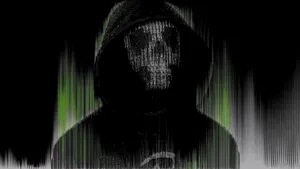 A Black And Green Hooded Figure With A Skull Wallpaper