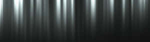 A Black And White Background With Light Streaks Wallpaper