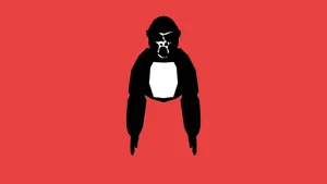 A Black And White Image Of A Penguin On A Red Background Wallpaper