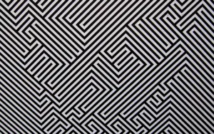 A Black And White Pattern With A Black And White Pattern Wallpaper