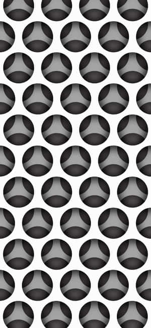 A Black And White Pattern With A Lot Of Circles Wallpaper