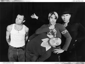 A Black And White Photo Of A Group Of Men Wallpaper