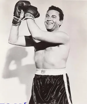 A Black And White Photo Of A Man With Boxing Gloves Wallpaper