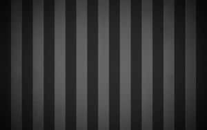 A Black And White Striped Wallpaper Wallpaper