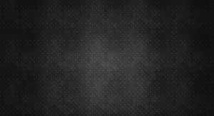 A Black Background With A Pattern Of Dots Wallpaper