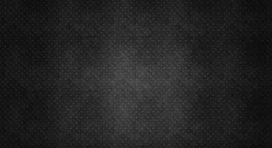 A Black Background With A Pattern Of Dots Wallpaper