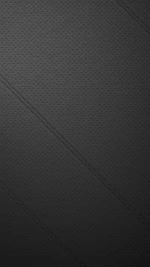 A Black Background With A Pattern Of Lines Wallpaper