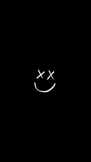 A Black Background With A White Smiley Face Wallpaper