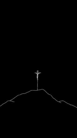 A Black Cross Stands Tall Against The Backdrop Of A Clear Night Sky. Wallpaper