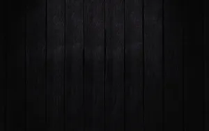 A Black Wooden Background With A Dark Background Wallpaper