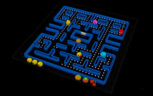 A Blue Pac-man Game With A Blue Background Wallpaper