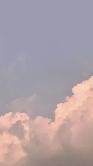 A Breathtaking View Of The Sky Filled With Clouds, Showing Off Its Beautiful, Aesthetic Appeal. Wallpaper