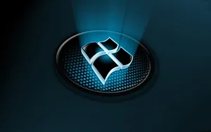 A Bright 3d Windows Logo Illuminated In The Darkness Wallpaper