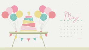 A Calendar With A Cake And Balloons Wallpaper