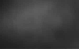 A Calm And Cool Gray Mountain Reflection Wallpaper