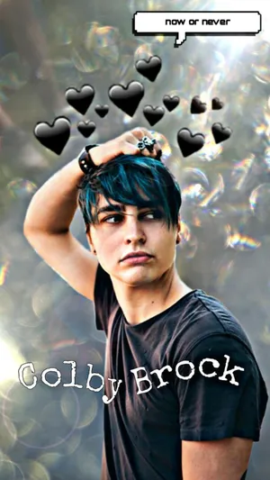A Candid Picture Of Colby Brock Smiling. Wallpaper