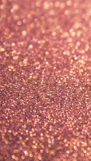 A Close Up Of A Pink Glitter Background Wallpaper
