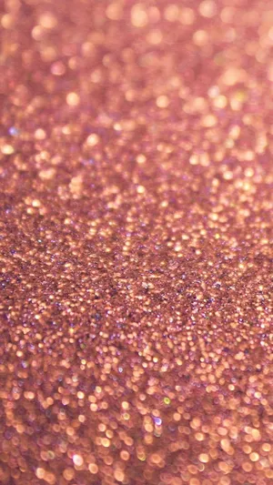 A Close Up Of A Pink Glitter Background Wallpaper