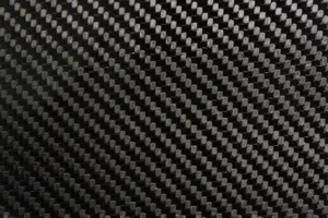 A Close Up Of Black And White Carbon Fiber Fabric Wallpaper