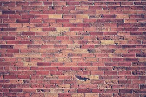 A Close-up View Of Aged, Stacked Bricks. Wallpaper