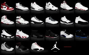 A Collection Of Air Jordan Shoes In Different Colors Wallpaper