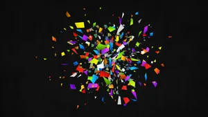 A Colorful Explosion Of Confetti On A Black Background Wallpaper