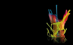 A Colorful Liquid Is Poured Into A Glass Wallpaper