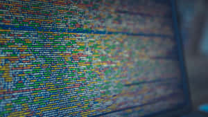 A Computer Screen With A Lot Of Code On It Wallpaper