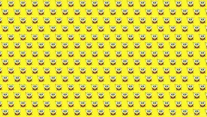 A Computer With A Minimalistic Yellow Aesthetic. Wallpaper