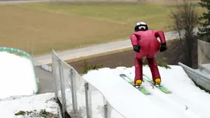 A Daring Leap - The Prowess Of Ski Jumping Wallpaper