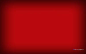 A Dark And Mysterious Red Background Wallpaper