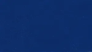 A Dark Blue Plane Against A Beautiful Sky Wallpaper