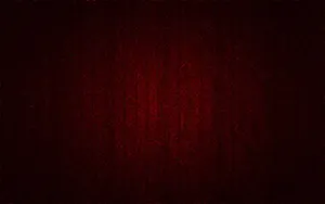 A Dark Red Background With A Dark Background Wallpaper