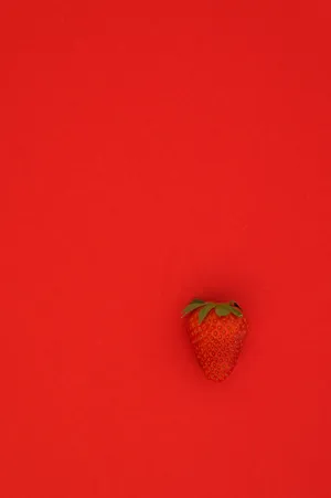 A Delicious And Juicy Red Strawberry. Wallpaper