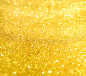 A Gold Glitter Background Wallpaper