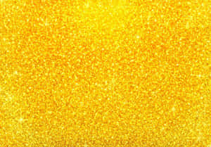 A Golden Glitter Background With Stars Wallpaper