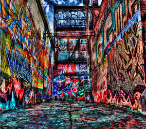 A Graffiti-painted Building In The City Wallpaper