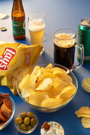 A Grand Feast With Assorted Chips Wallpaper