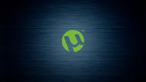 A Green Logo On A Black Background Wallpaper