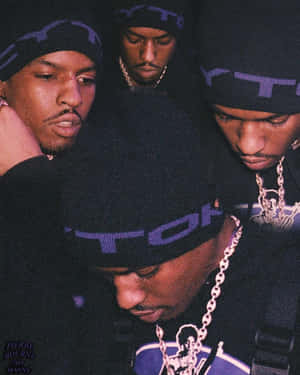 A Group Of Men In Black And Purple Hats Wallpaper