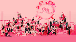 A Group Of People In Pink Posing For A Picture Wallpaper