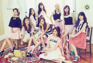 A Group Of Young Women Posing For A Photo Wallpaper