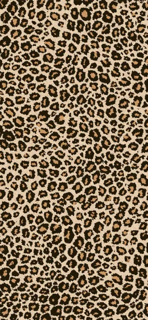 A Leopard Print Fabric With Black And Brown Spots Wallpaper