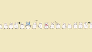 A Line Of White Cats Standing In A Row Wallpaper