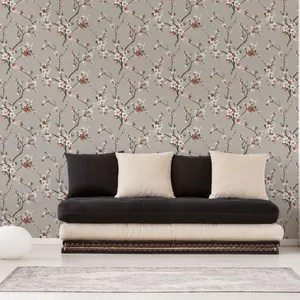 A Living Room With A Couch And A Floral Wallpaper Wallpaper