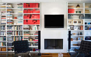 A Living Room With A Fireplace And Bookshelves Wallpaper