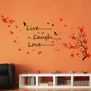 A Living Room With A Wall Decal With The Words Live Laugh Love Wallpaper