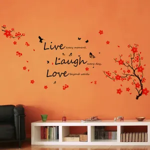 A Living Room With A Wall Decal With The Words Live Laugh Love Wallpaper